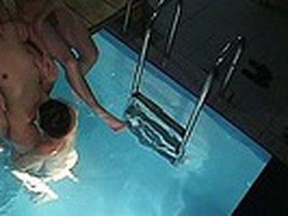 Spying in sauna is always worth the efforts! Enjoy the wild fuck session in the pool with the guy supporting excited naked bimbo when his friend is wildly pumping her snatch with water slopping inside the hole!