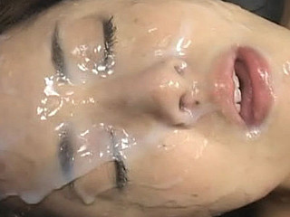 Manami Suzuki in a messy bukkake facial clip getting cumshots to her face from lots of dudes.