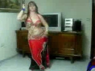 Amateur sexy Arab dances in full costume for the livecam on top of her laptop in this private video. You can see her dance around the room and shake her belly and ass