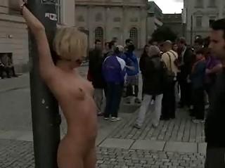 Blonde tied and bare in public